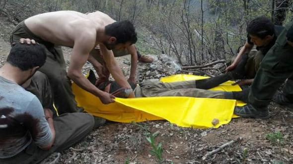 Teröristler cesetleri topladı