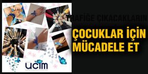 Çocuklar için mavi kurdele tak