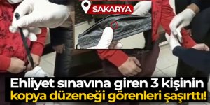 Ehliyet sınavına giren 3 kişinin kopya düzeneği görenleri şaşırttı